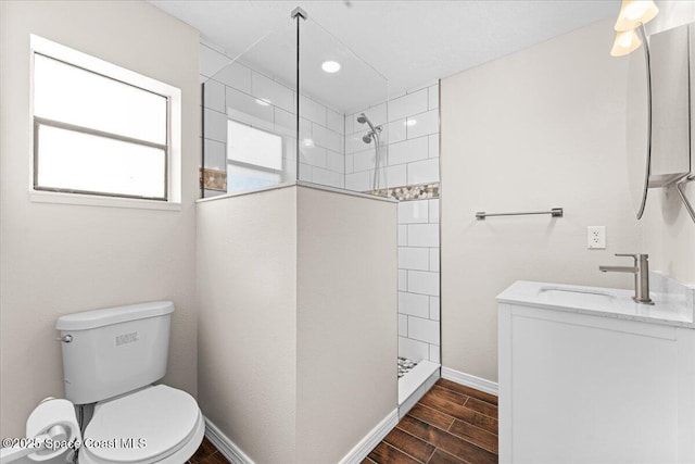 5510 Holden Rd, Cocoa, FL 32927 - full bathroom featuring vanity, wood finished floors, and a walk in shower