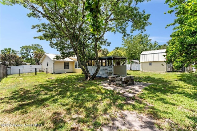 5510 Holden Rd, Cocoa, FL 32927 - fenced backyard with a sunroom