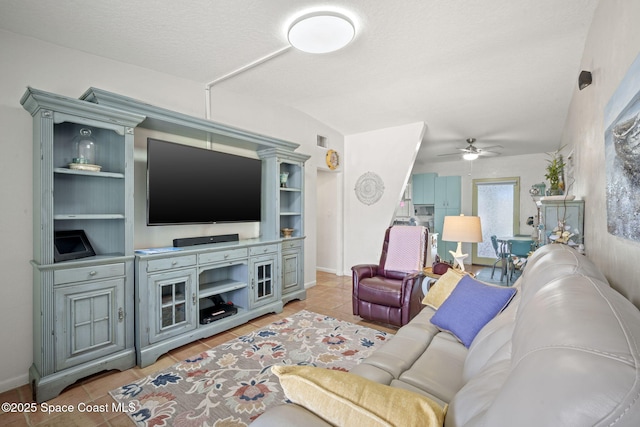 1030 S Orlando Ave, Cocoa Beach, FL 32931 - tiled living room with ceiling fan