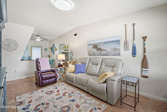 1030 S Orlando Ave, Cocoa Beach, FL 32931 - living room featuring a ceiling fan, tile patterned flooring, and lofted ceiling
