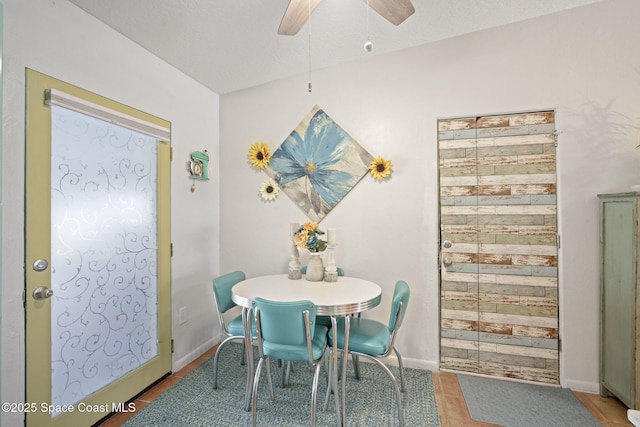 1030 S Orlando Ave, Cocoa Beach, FL 32931 - dining room with a ceiling fan and baseboards