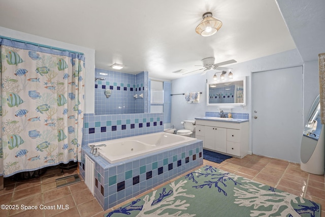 1030 S Orlando Ave, Cocoa Beach, FL 32931 - full bathroom with tile patterned flooring, vanity, and a ceiling fan