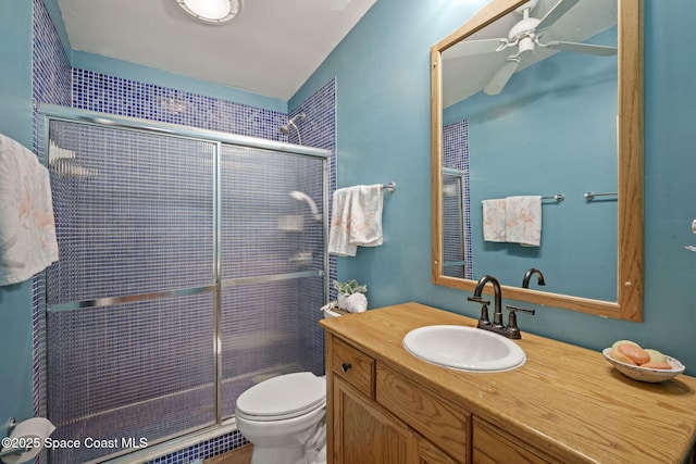 1030 S Orlando Ave, Cocoa Beach, FL 32931 - full bathroom with ceiling fan, vanity, and a shower stall