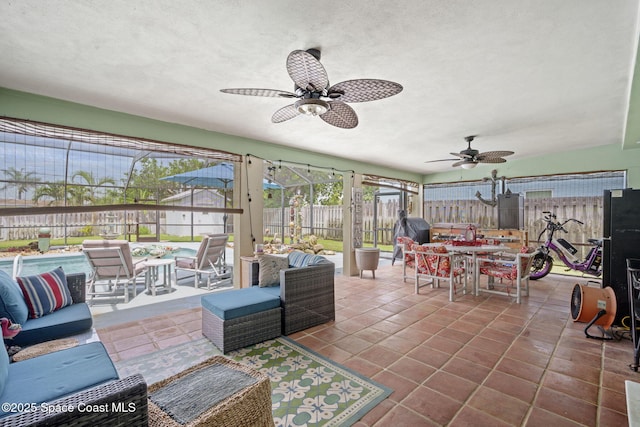 1030 S Orlando Ave, Cocoa Beach, FL 32931 - fenced backyard featuring outdoor lounge area, ceiling fan, a patio, and outdoor dining area