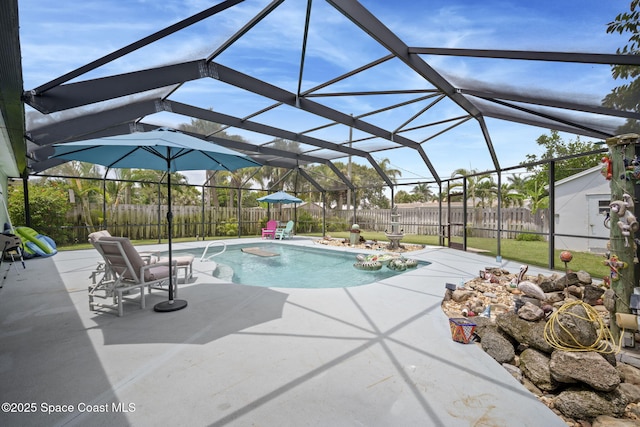 1030 S Orlando Ave, Cocoa Beach, FL 32931 - view of pool with a patio, a fenced backyard, and glass enclosure