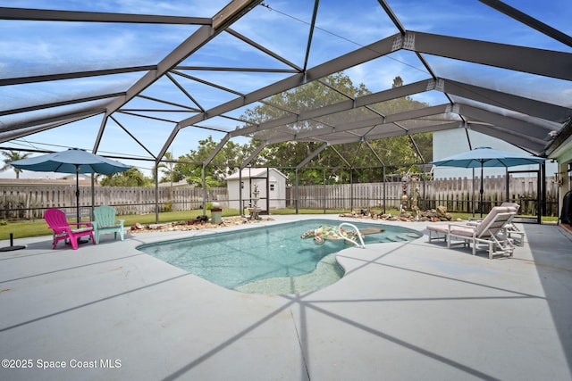 1030 S Orlando Ave, Cocoa Beach, FL 32931 - view of swimming pool with a patio, a storage shed, a fenced backyard, and a lanai
