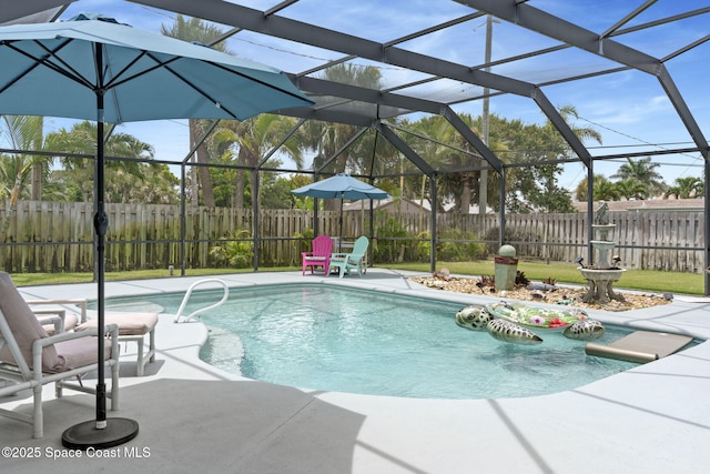 1030 S Orlando Ave, Cocoa Beach, FL 32931 - view of pool with a patio, a fenced backyard, and a lanai