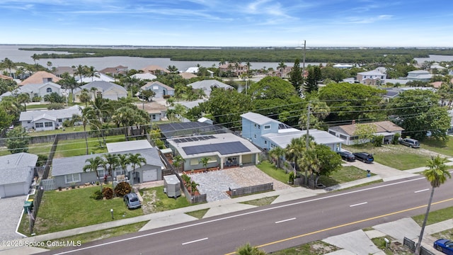 1030 S Orlando Ave, Cocoa Beach, FL 32931 - aerial view of residential area with a nearby body of water