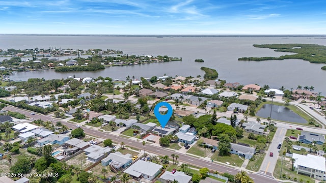 1030 S Orlando Ave, Cocoa Beach, FL 32931 - aerial view of property's location with a nearby body of water and nearby suburban area