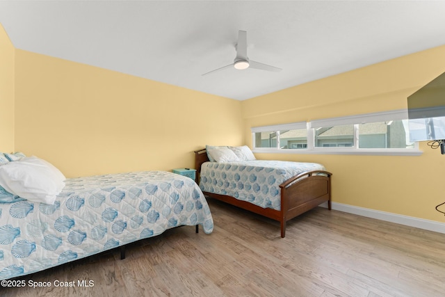 1710 Atlantic St Unit 5E, Melbourne Beach, FL 32951 - bedroom with wood finished floors and ceiling fan