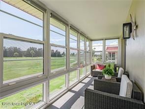 55 Woodland Dr Unit 206, Vero Beach, FL 32962 - sunroom / solarium with an outdoor living space