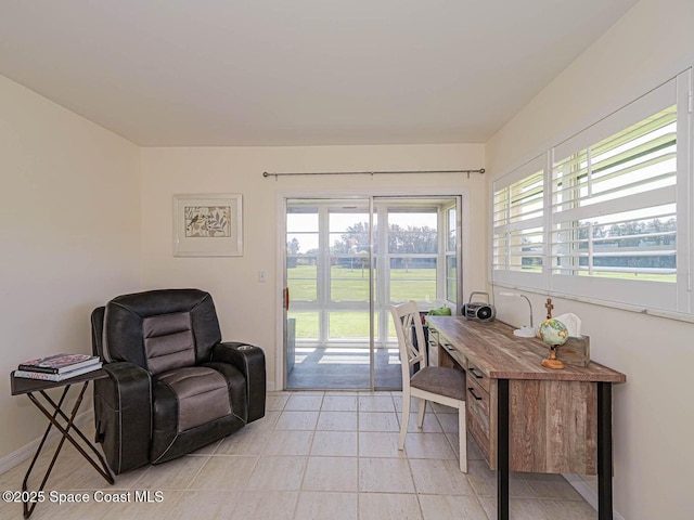55 Woodland Dr Unit 206, Vero Beach, FL 32962 - home office with baseboards