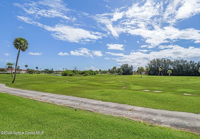 55 Woodland Dr Unit 206, Vero Beach, FL 32962 - view of property's community with a lawn