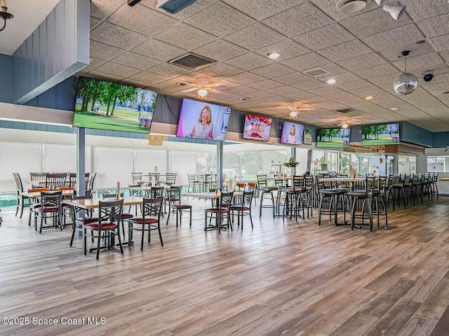 55 Woodland Dr Unit 206, Vero Beach, FL 32962 - dining space with wood finished floors