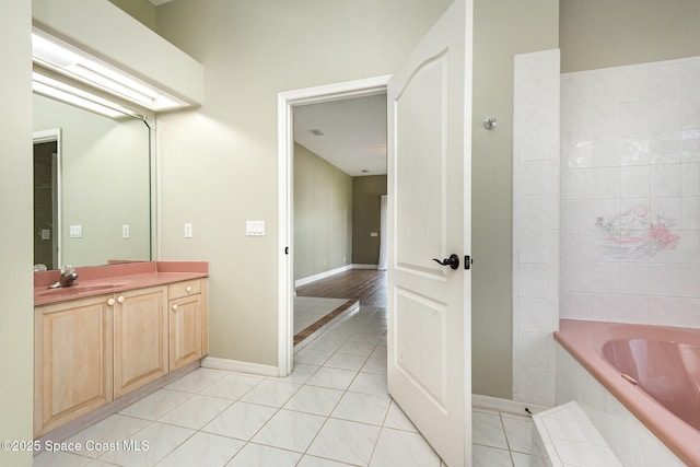 465 Apache Trl, Merritt Island, FL 32953 - full bathroom featuring tiled bath, vanity, and tile patterned floors