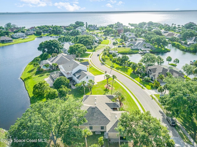 465 Apache Trl, Merritt Island, FL 32953 - aerial view of property's location with nearby suburban area and a large body of water
