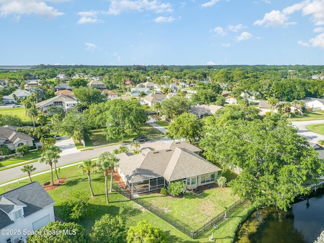 465 Apache Trl, Merritt Island, FL 32953 - aerial perspective of suburban area with a large body of water