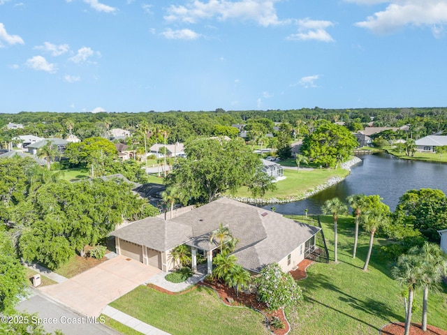 465 Apache Trl, Merritt Island, FL 32953 - aerial view of residential area featuring a nearby body of water