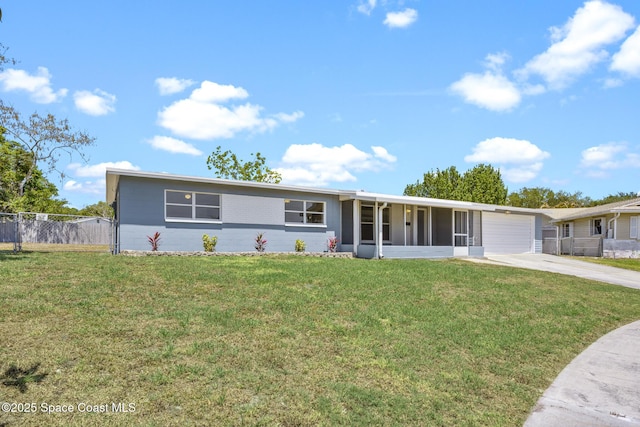 2812 Denison Ct, Cocoa, FL 32926 - ranch-style house with concrete driveway, an attached garage, and a sunroom