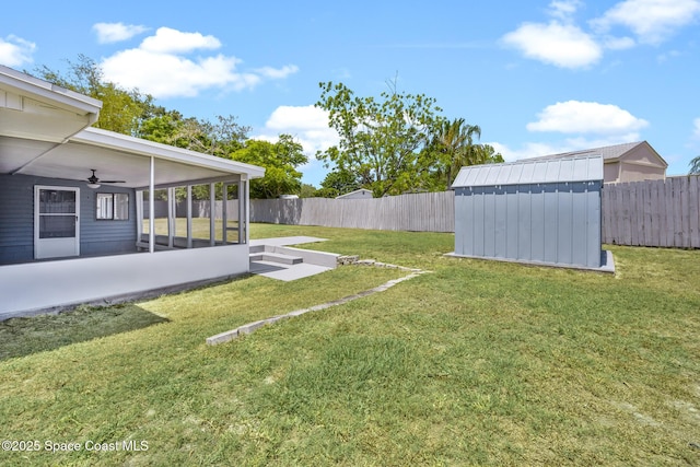 2812 Denison Ct, Cocoa, FL 32926 - fenced backyard with a sunroom, a shed, and a ceiling fan