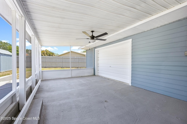 2812 Denison Ct, Cocoa, FL 32926 - unfurnished sunroom featuring healthy amount of natural light and a ceiling fan