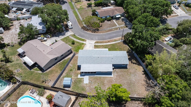 2812 Denison Ct, Cocoa, FL 32926 - aerial overview of property's location featuring a pool and nearby suburban area