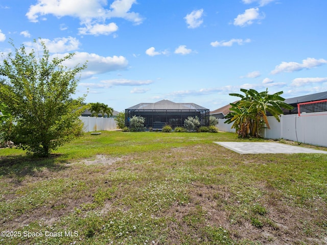 3662 Brantley Cir, Rockledge, FL 32955 - fenced backyard with glass enclosure and a patio