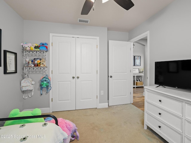 3662 Brantley Cir, Rockledge, FL 32955 - bedroom with a closet, light colored carpet, and ceiling fan