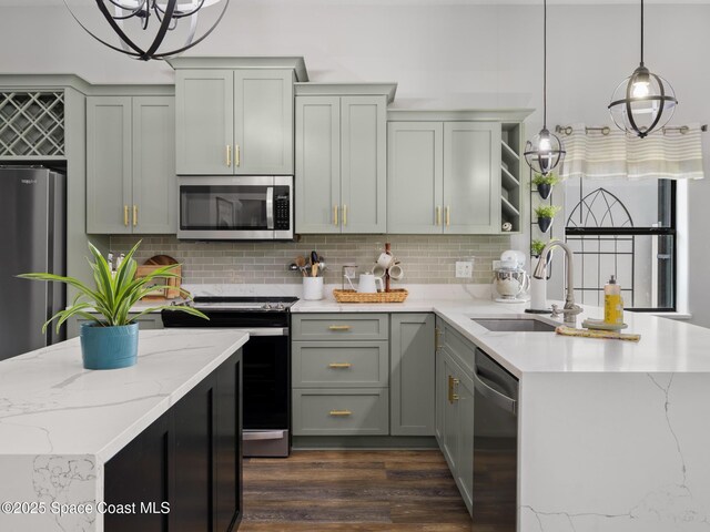 3662 Brantley Cir, Rockledge, FL 32955 - kitchen with stainless steel appliances, open shelves, dark wood-type flooring, and decorative light fixtures