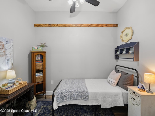 3662 Brantley Cir, Rockledge, FL 32955 - bedroom with wood finished floors and a ceiling fan