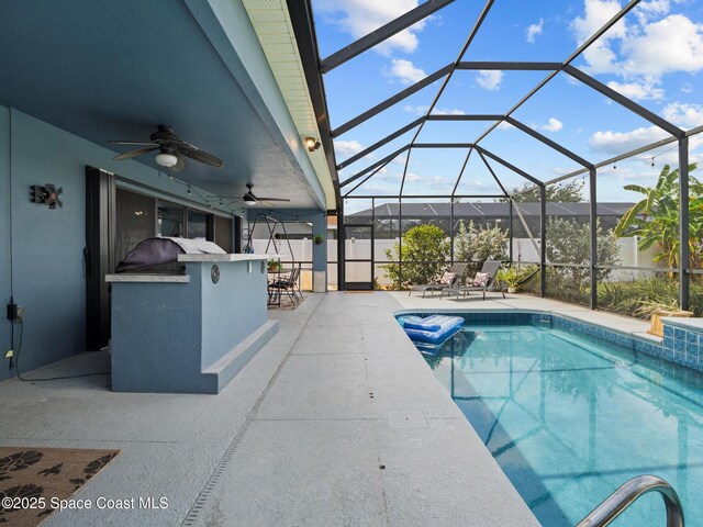 3662 Brantley Cir, Rockledge, FL 32955 - swimming pool featuring a patio, ceiling fan, and glass enclosure