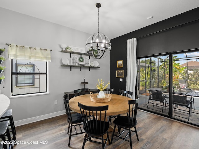 3662 Brantley Cir, Rockledge, FL 32955 - dining room with wood finished floors and a chandelier