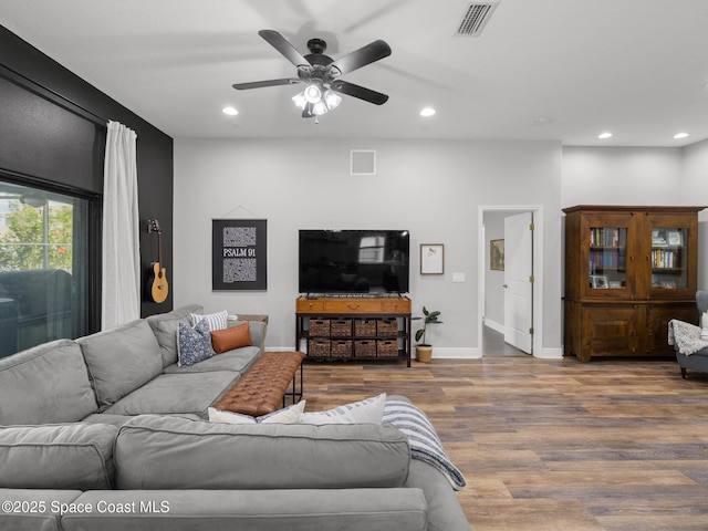 3662 Brantley Cir, Rockledge, FL 32955 - living room with recessed lighting, ceiling fan, and wood finished floors
