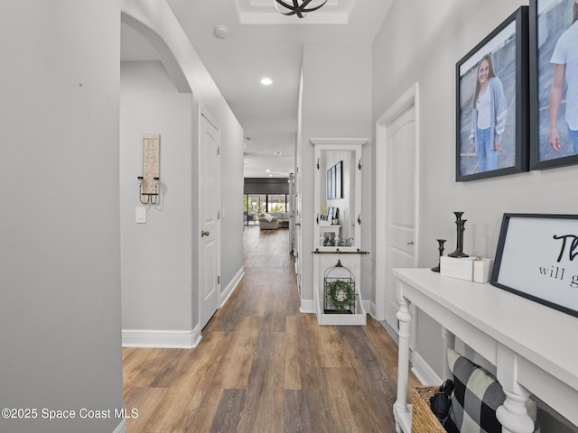 3662 Brantley Cir, Rockledge, FL 32955 - hallway with wood finished floors, arched walkways, and recessed lighting