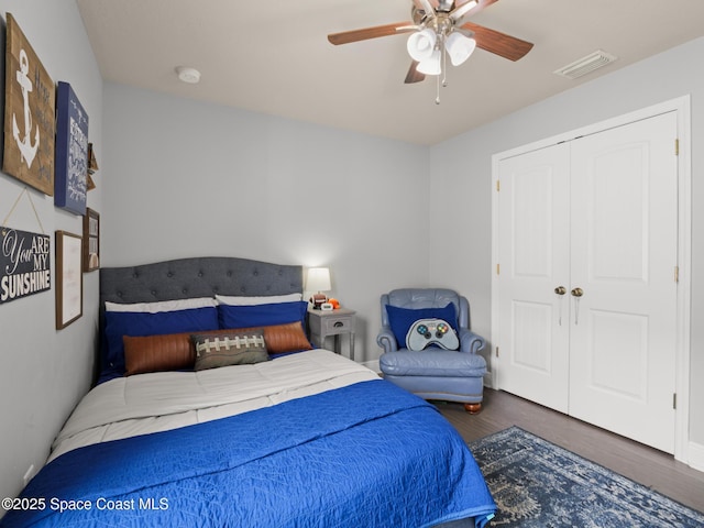3662 Brantley Cir, Rockledge, FL 32955 - bedroom featuring wood finished floors, a closet, and ceiling fan