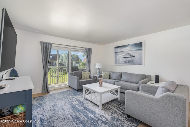 170 Paradise Blvd # 17, Indialantic, FL 32903 - living room with wood finished floors
