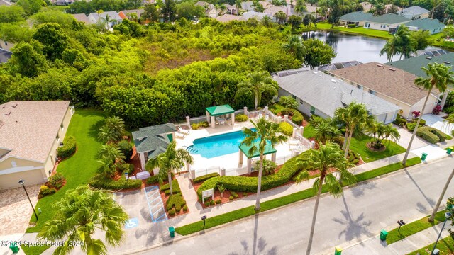 621 Misty Creek Dr, Melbourne, FL 32940 - aerial perspective of suburban area featuring a pool