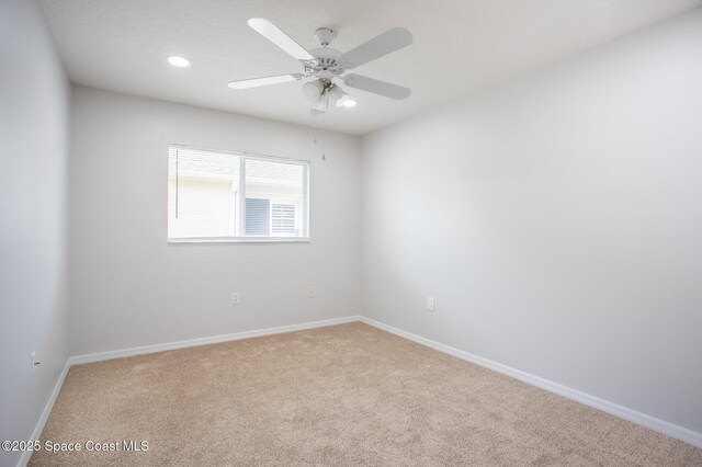 621 Misty Creek Dr, Melbourne, FL 32940 - unfurnished room with carpet flooring, recessed lighting, and a ceiling fan