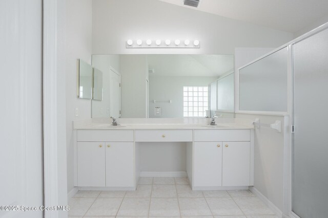 621 Misty Creek Dr, Melbourne, FL 32940 - bathroom with double vanity and tile patterned floors