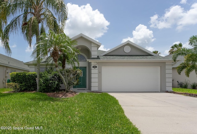 621 Misty Creek Dr, Melbourne, FL 32940 - ranch-style home with stucco siding, concrete driveway, an attached garage, a front yard, and roof with shingles