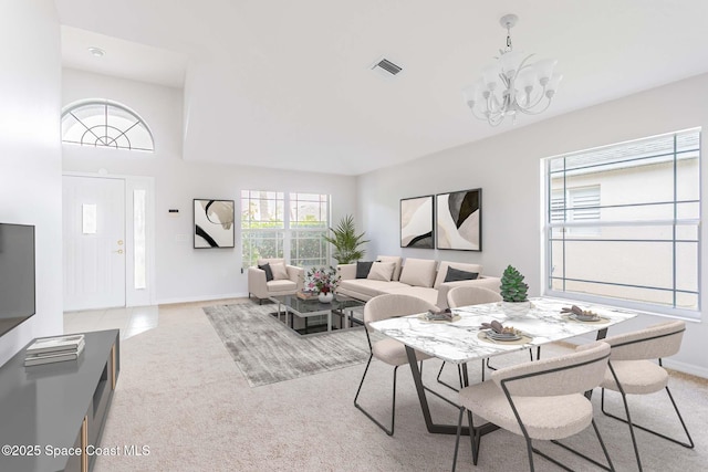 621 Misty Creek Dr, Melbourne, FL 32940 - living area with light colored carpet and a chandelier