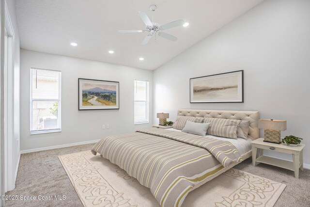 621 Misty Creek Dr, Melbourne, FL 32940 - bedroom with light carpet, vaulted ceiling, recessed lighting, and a ceiling fan