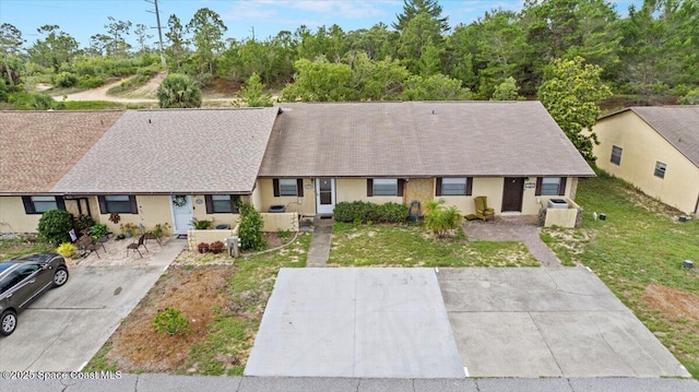 1289 Cheney Hwy Unit B, Titusville, FL 32780 - view of front facade featuring a front yard