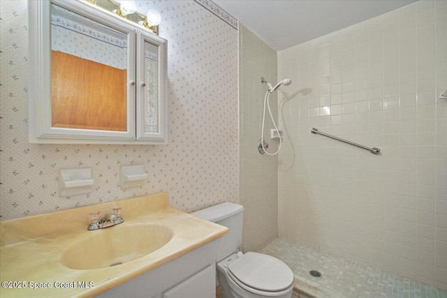 1289 Cheney Hwy Unit B, Titusville, FL 32780 - bathroom featuring wallpapered walls, a tile shower, and vanity