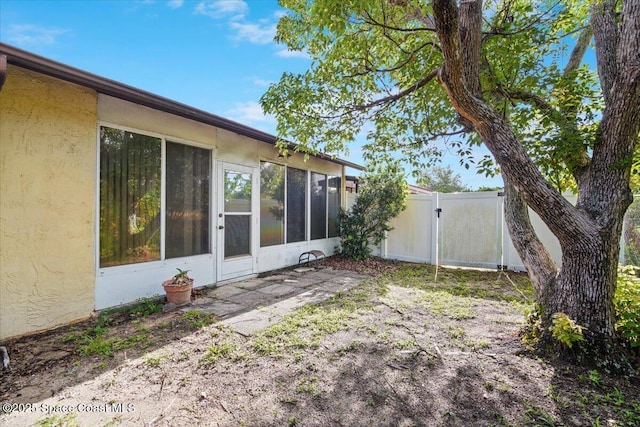 1289 Cheney Hwy Unit B, Titusville, FL 32780 - view of yard with a gate and a patio area