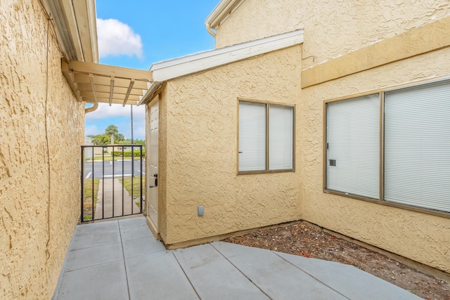 1441 Sheafe Ave NE Unit 104, Palm Bay, FL 32905 - view of patio / terrace featuring a gate