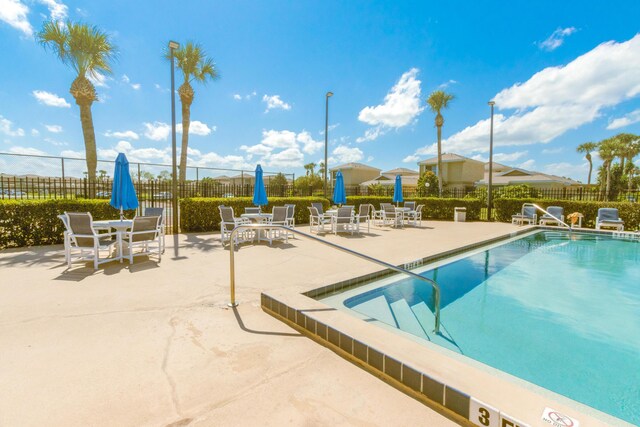 1441 Sheafe Ave NE Unit 104, Palm Bay, FL 32905 - community pool with a patio