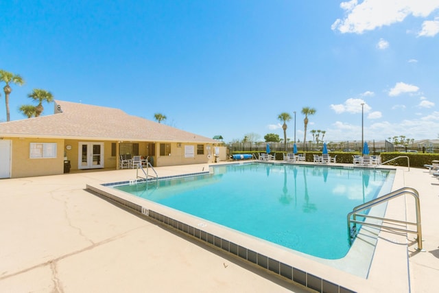 1441 Sheafe Ave NE Unit 104, Palm Bay, FL 32905 - community pool featuring french doors and a patio area