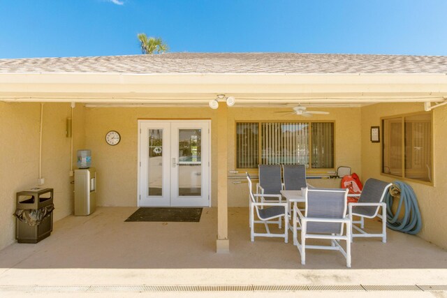 1441 Sheafe Ave NE Unit 104, Palm Bay, FL 32905 - view of patio with french doors, a ceiling fan, washer / dryer, and outdoor dining space