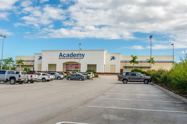 1441 Sheafe Ave NE Unit 104, Palm Bay, FL 32905 - view of uncovered parking lot